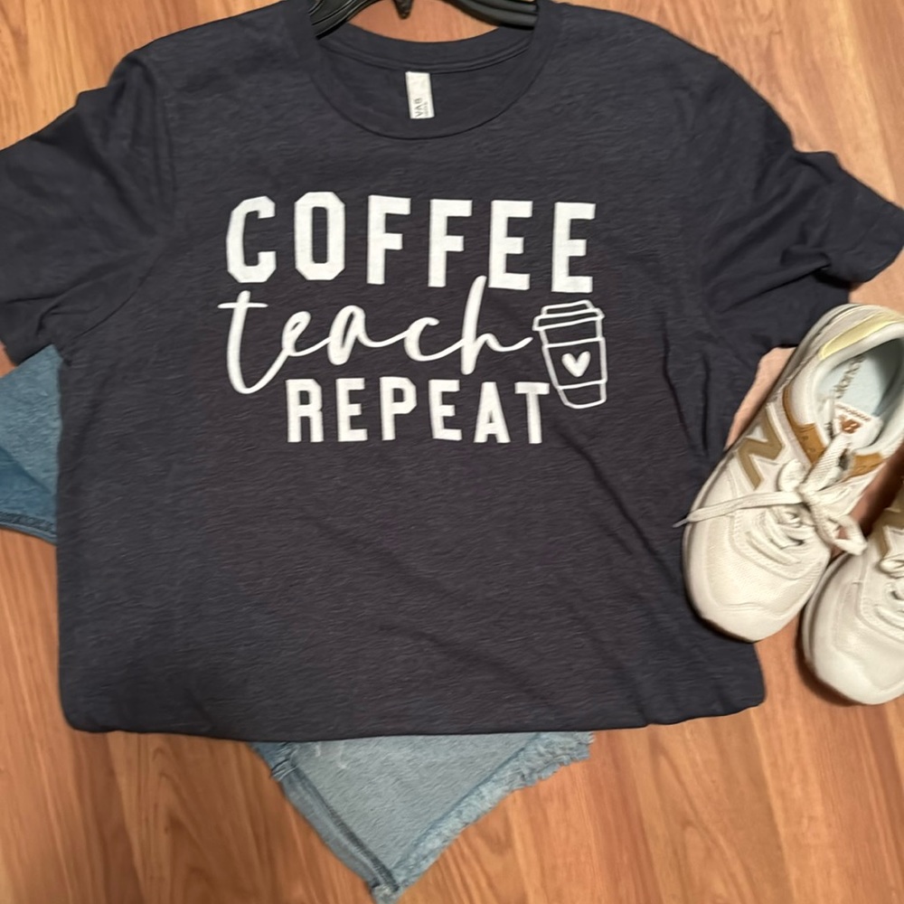 Soft teacher tee in great shape. The color is a deep Heather Navy